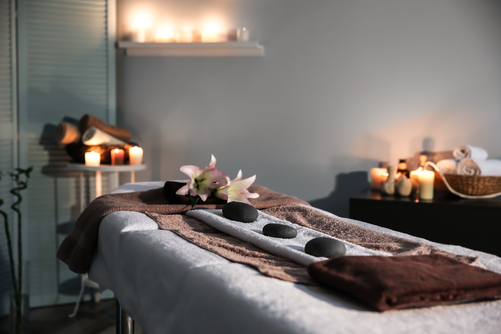 Candle-lit treatment room at Lumière Aesthetics